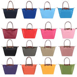 a selection of colorful handbags