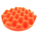 a close up of a waffle on a white surface