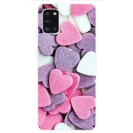 A pile of pink and white hearts on a white background