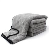 a pile of grey towels