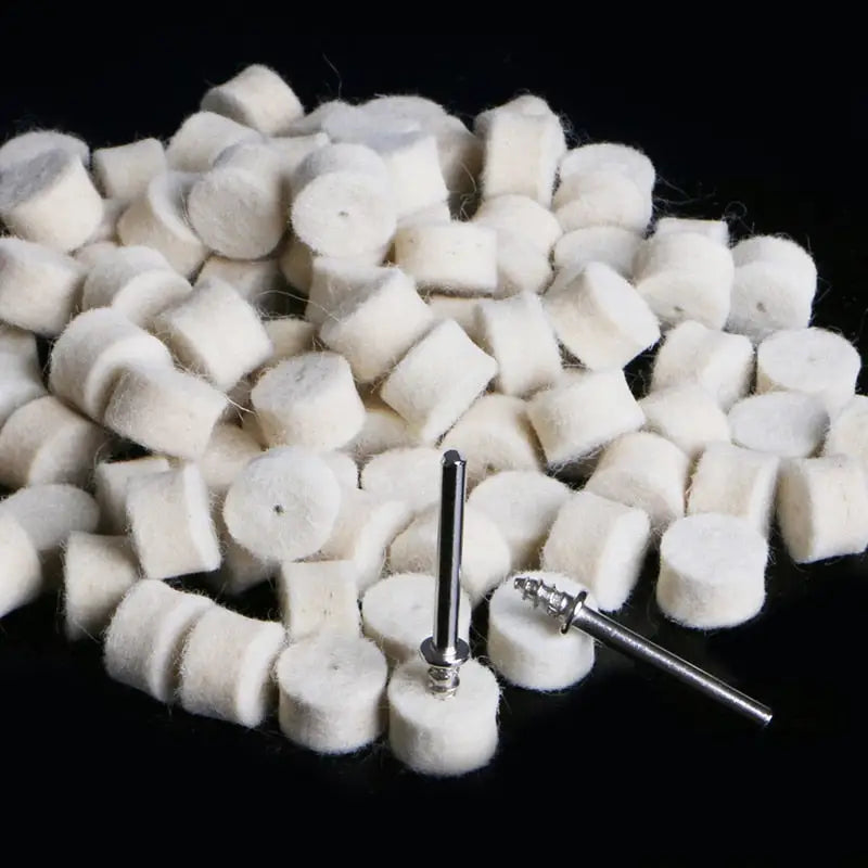 a pile of white wool on a black background