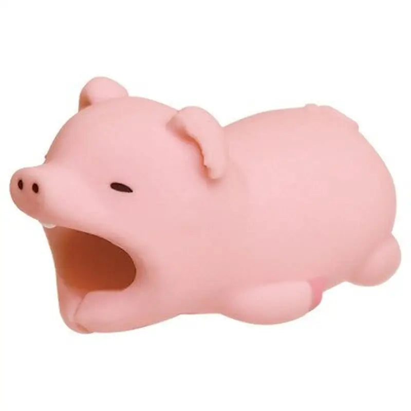 a pink pig toy on a white background