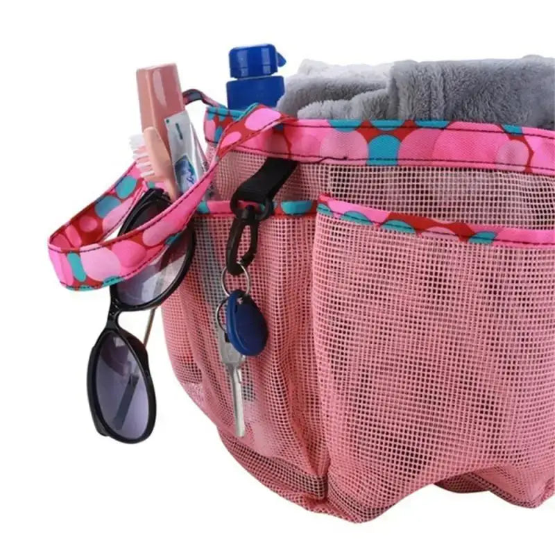 a pink bag with a pink and blue polka print