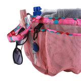a pink bag with a pink and blue polka print