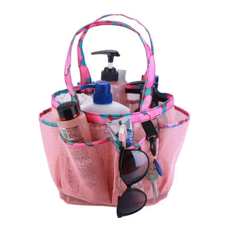 a pink bag with a bottle and sunglasses