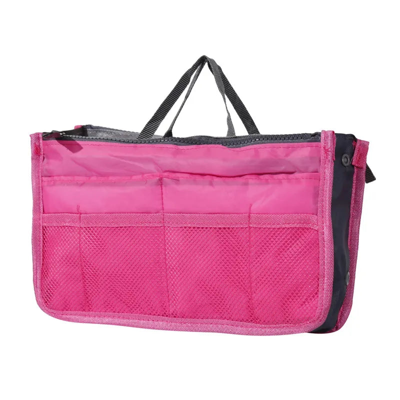 the pink bag is a large, foldable, foldable, and portable travel organizer