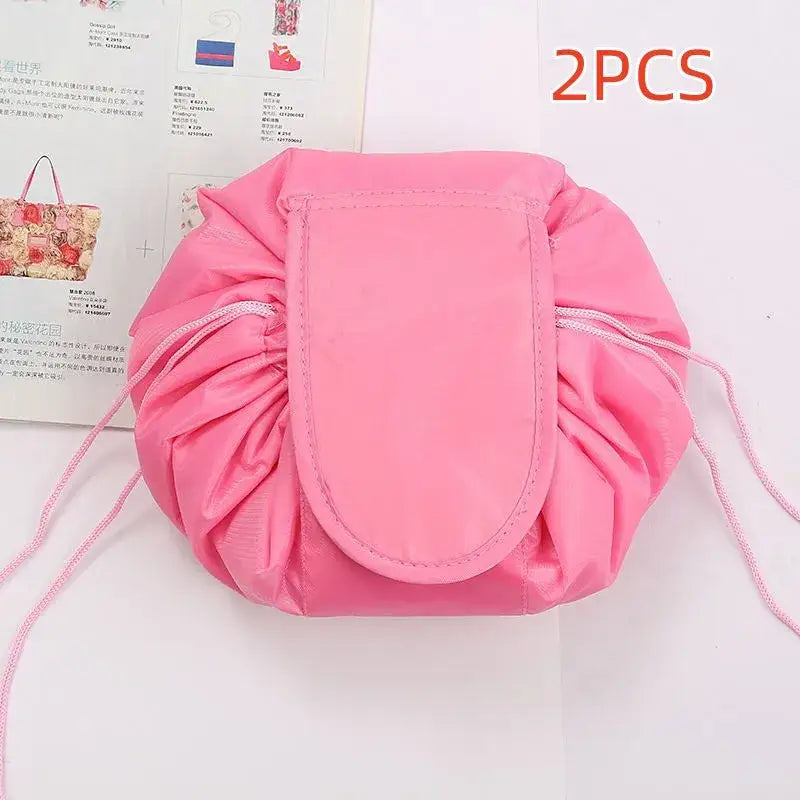 a pink bag with a pink ribbon around it