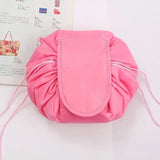 a pink bag with a pink ribbon around it