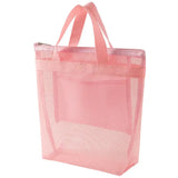 a pink shopping bag with a zipper closure