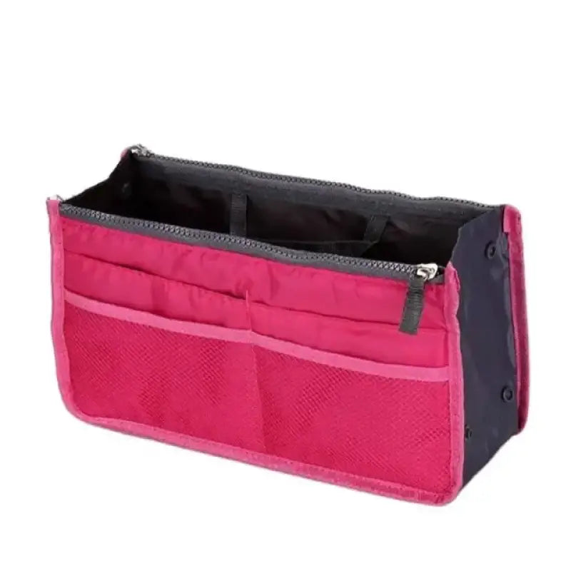 a pink and black bag with a zipper