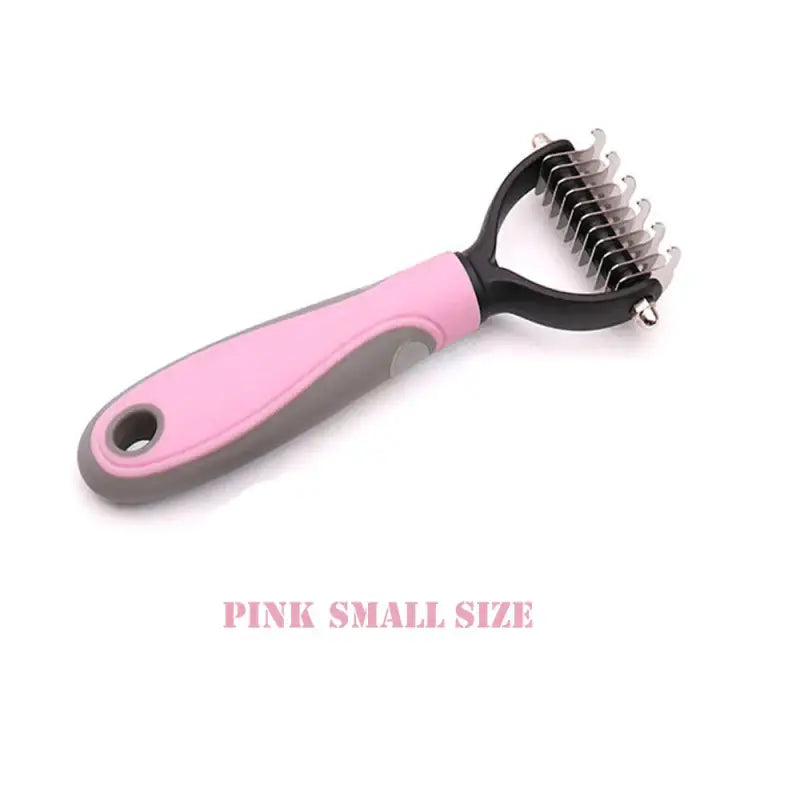 a pink and black hair brush with a black handle