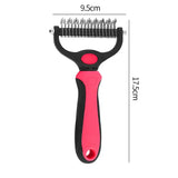 a pink and black hair clipper with a black handle