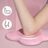 a woman’s legs with a pink foot pad