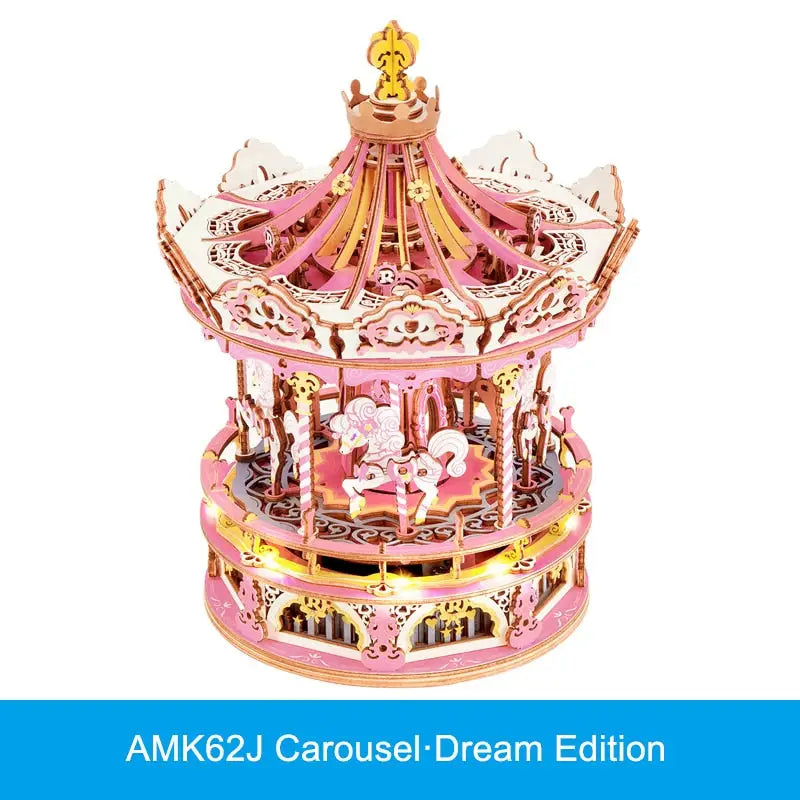 a pink carousel with a gold crown on top