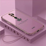 a pink case with a gold phone on top