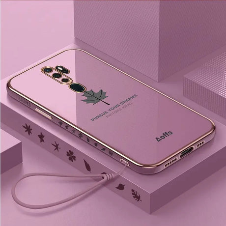 a pink case with a gold phone on top