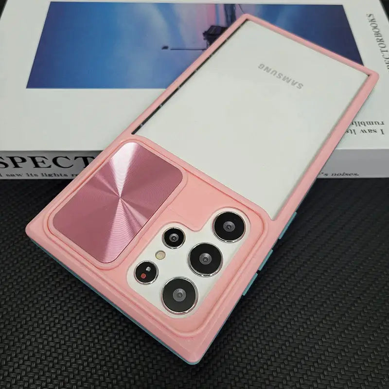 a pink case with two camera lenses on it