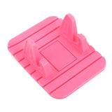 a pink plastic clip holder for a camera