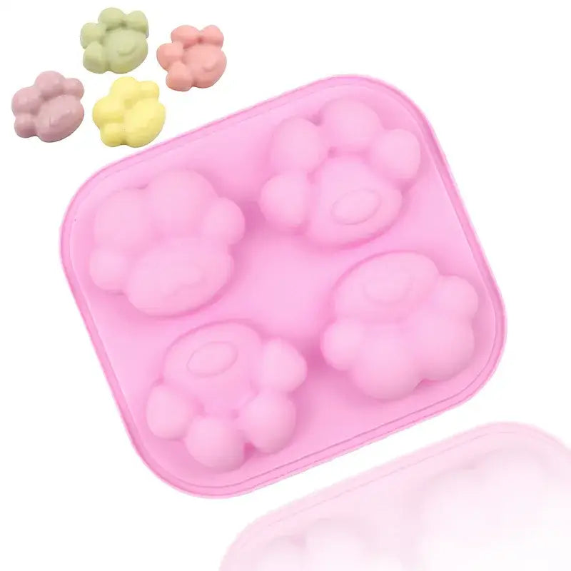 a pink container filled with small plastic balls