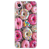 a close up of a phone case with a bunch of donuts