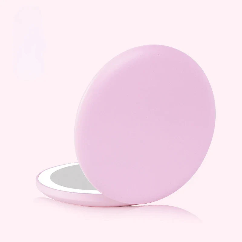 a pink egg on a white background