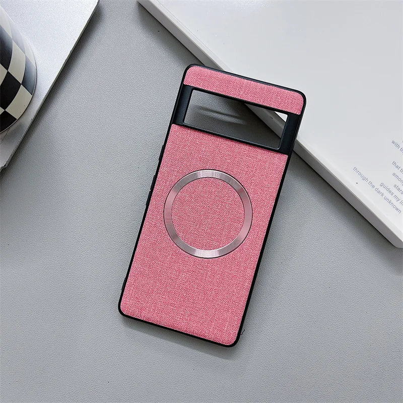 Pink fabric-covered smartphone case with a circular cutout and black accents.