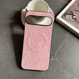 Pink faux leather phone case with a camera cutout and circular magnetic ring.