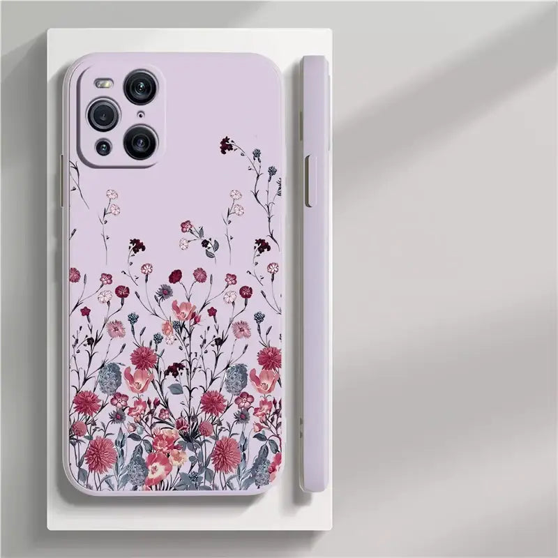 the pink floral iphone case is shown on a white surface