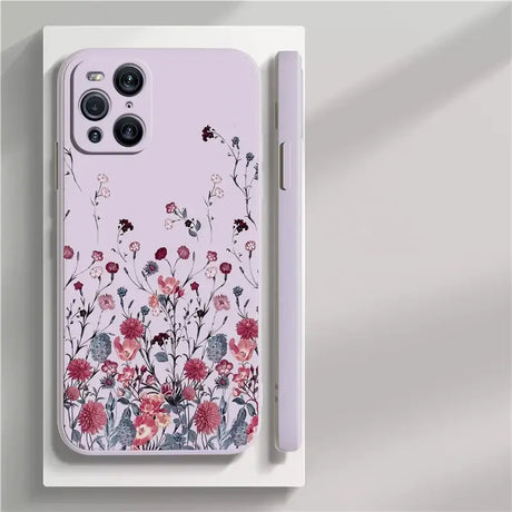 The pink floral iphone case is shown on a white surface