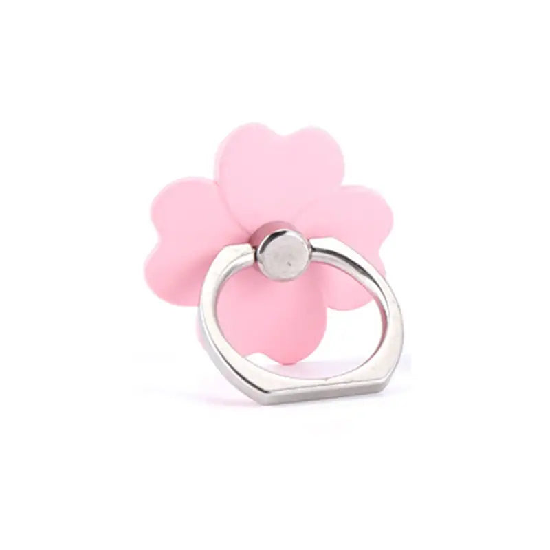 a pink flower ring with a silver ring