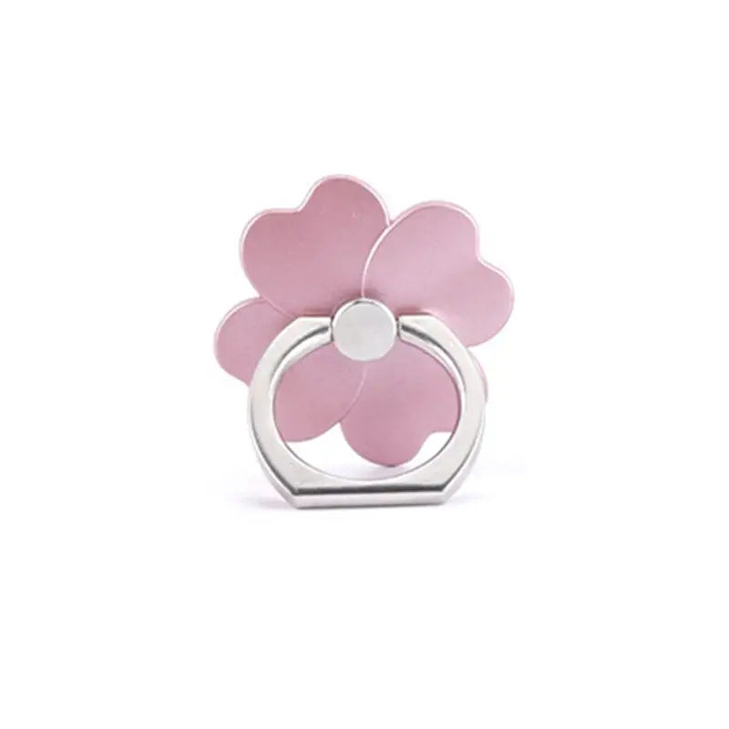 a pink flower ring with a white center