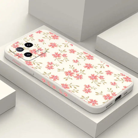 a phone case with pink flowers on it