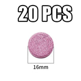 a pink glitter button with the number 20 on it