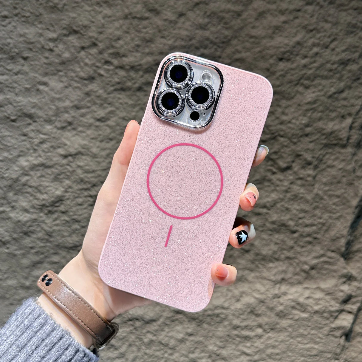 Pink glittery phone case.