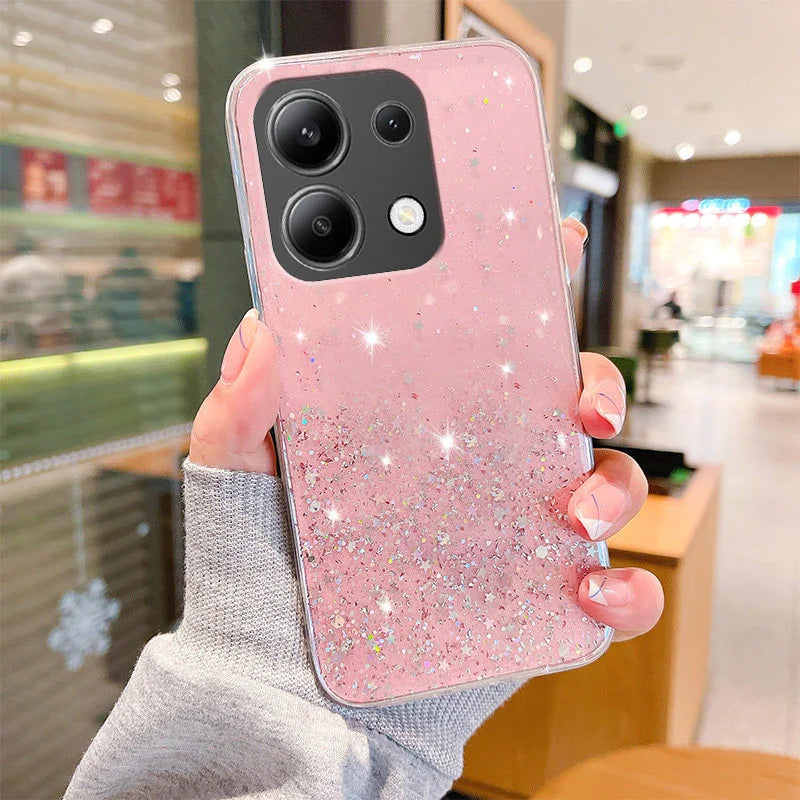 Pink glittery smartphone case with a star pattern.