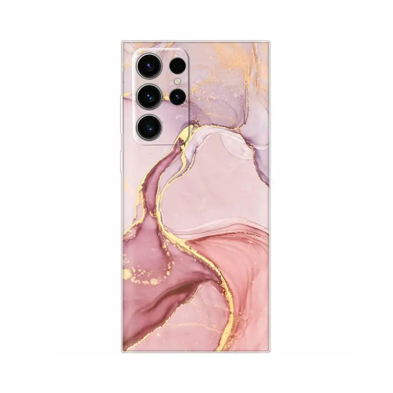 a pink and gold marble phone case with a gold foil design