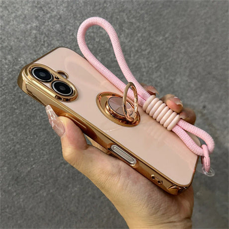 Pink and gold phone case with ring stand and lanyard.