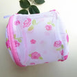 a pink and green rose print mesh bag