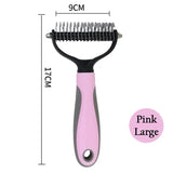 a pink hair brush with a black handle