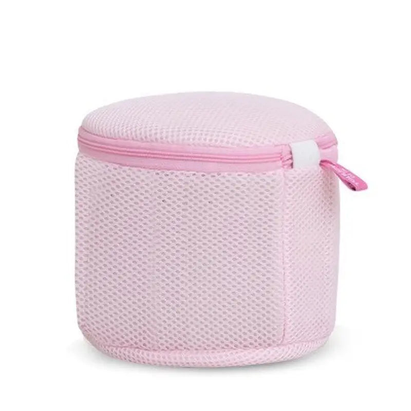 a close up of a pink bag with a zipper on it