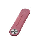 a pink plastic bottle opener with a metal handle