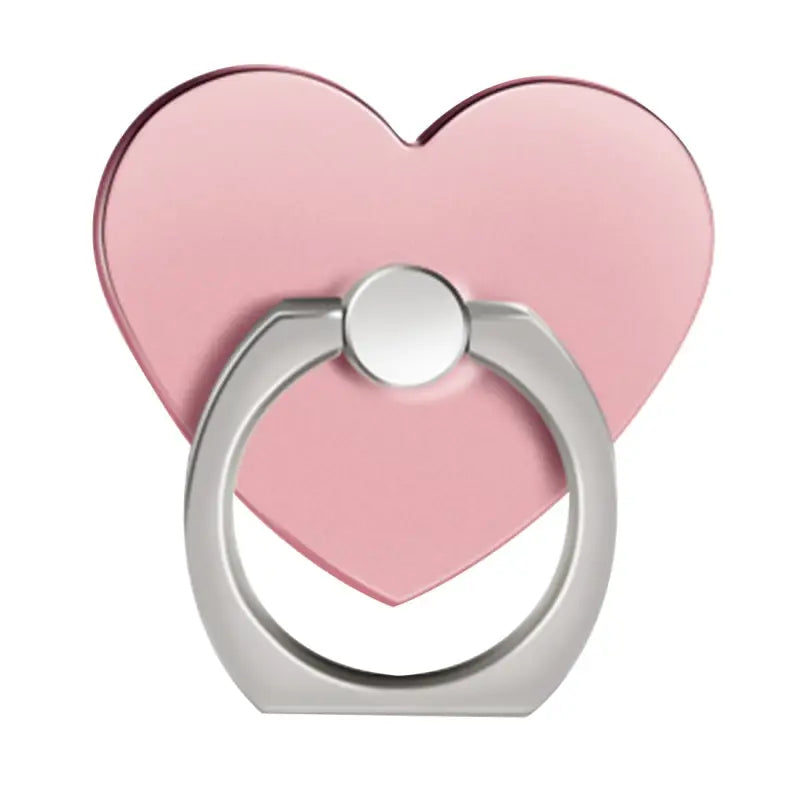 a pink heart shaped ring with a white background