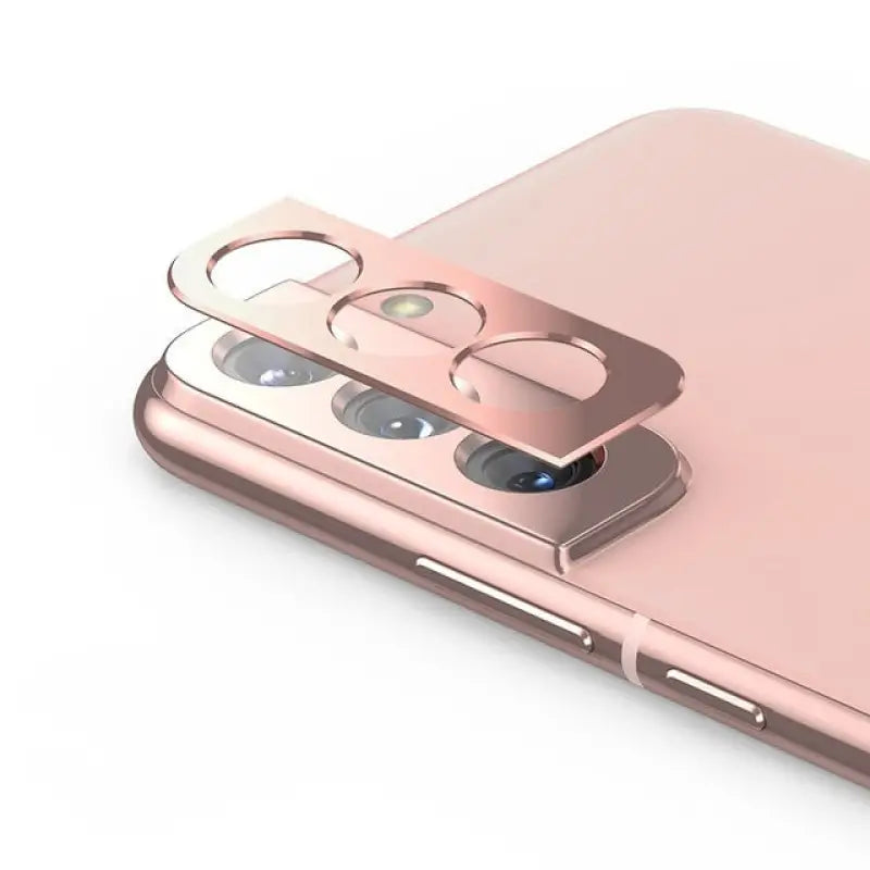 the back of a pink iphone with a camera lens