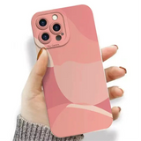 Pink iPhone case with an abstract curved pattern design.