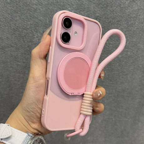 Pink iPhone case with a built-in ring stand and wrist strap.
