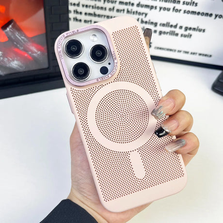 Pink iPhone case with a circular perforated pattern and MagSafe charging ring.