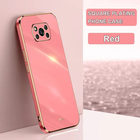 a pink iphone case with a gold frame