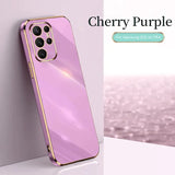 A pink iphone case with a gold frame