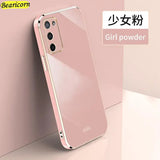 the back of a pink iphone case with a gold frame