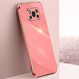 a pink iphone case with a gold frame